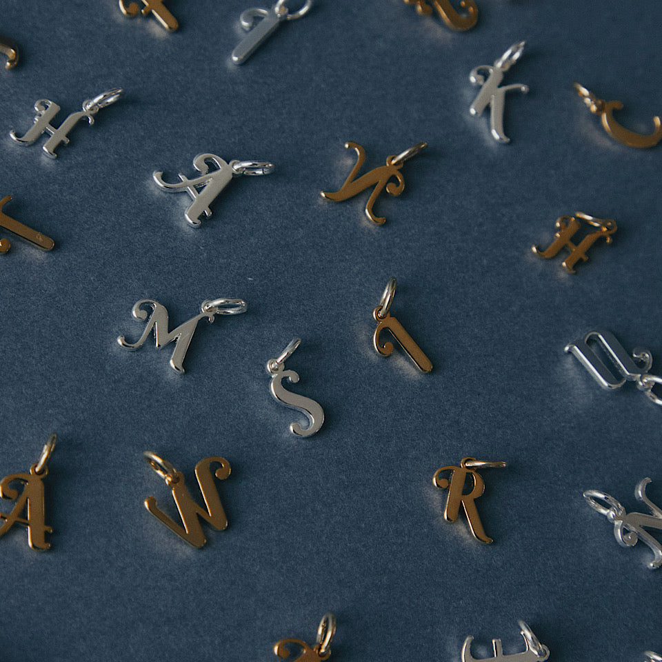 initial charm