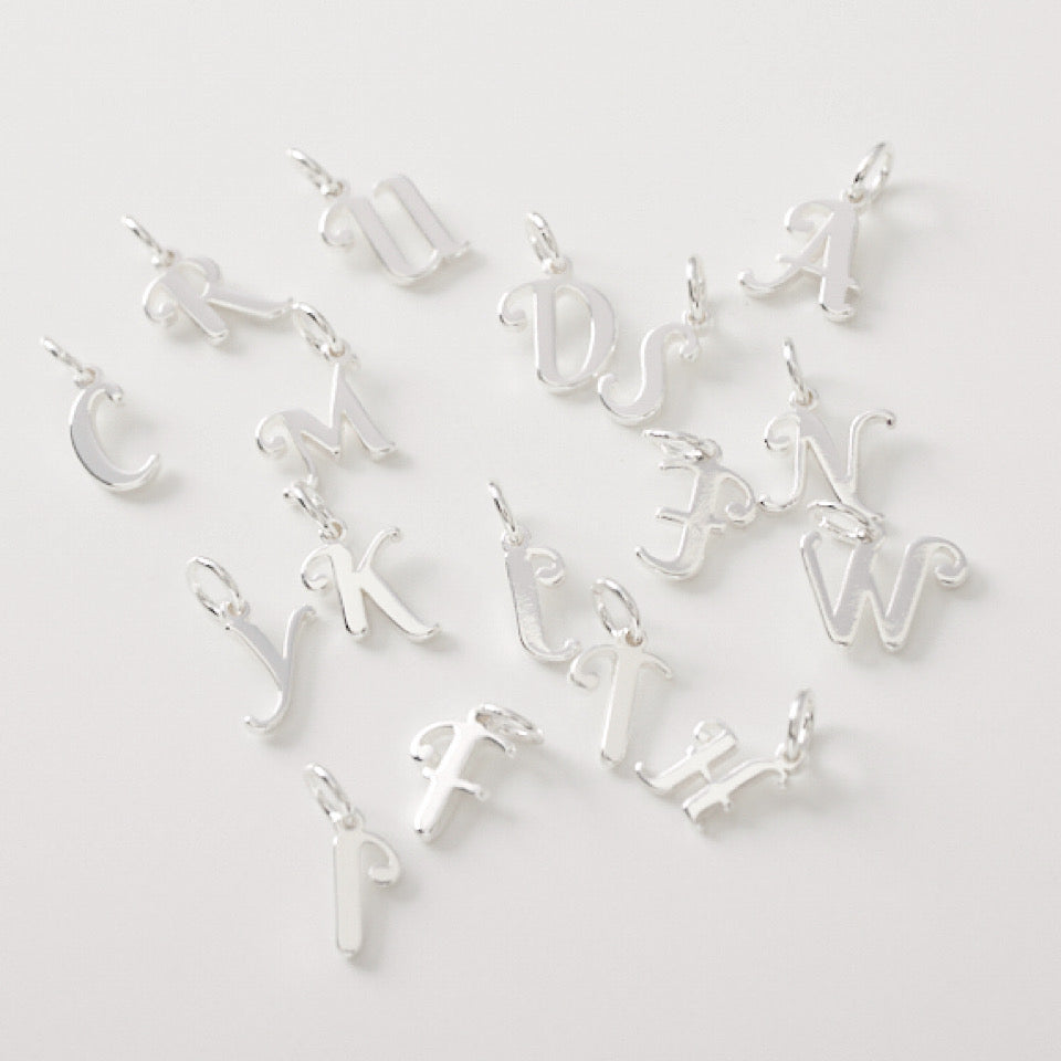 initial charm