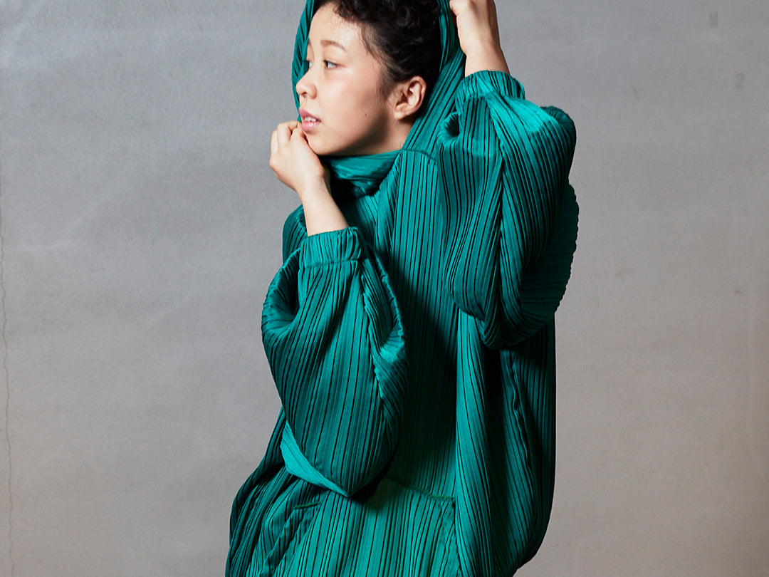 goen° Pleats hoodie green